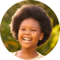 Smiling and laughing young girl outdoors